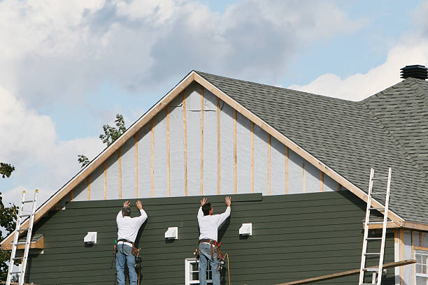 Professional Vinyl Siding technician working in King, NC